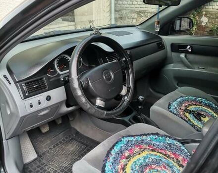 Черный Шевроле Лачетти, объемом двигателя 1.8 л и пробегом 270 тыс. км за 4600 $, фото 5 на Automoto.ua