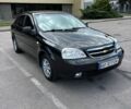 Черный Шевроле Лачетти, объемом двигателя 1.6 л и пробегом 128 тыс. км за 4300 $, фото 1 на Automoto.ua