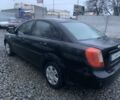Черный Шевроле Лачетти, объемом двигателя 1.6 л и пробегом 198 тыс. км за 3333 $, фото 2 на Automoto.ua