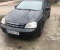 Черный Шевроле Лачетти, объемом двигателя 1.6 л и пробегом 300 тыс. км за 2999 $, фото 1 на Automoto.ua
