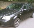 Черный Шевроле Лачетти, объемом двигателя 1.8 л и пробегом 207 тыс. км за 3100 $, фото 1 на Automoto.ua