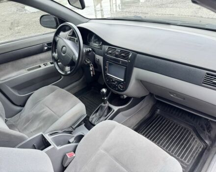 Черный Шевроле Лачетти, объемом двигателя 1.8 л и пробегом 222 тыс. км за 4099 $, фото 7 на Automoto.ua