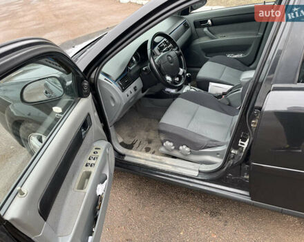 Чорний Шевроле Лачетті, об'ємом двигуна 1.8 л та пробігом 315 тис. км за 4550 $, фото 10 на Automoto.ua