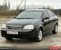 Чорний Шевроле Лачетті, об'ємом двигуна 1.8 л та пробігом 241 тис. км за 3950 $, фото 1 на Automoto.ua