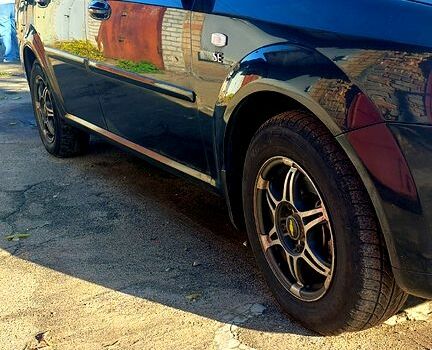 Чорний Шевроле Лачетті, об'ємом двигуна 1.6 л та пробігом 242 тис. км за 4600 $, фото 4 на Automoto.ua