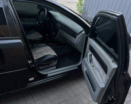 Черный Шевроле Лачетти, объемом двигателя 1.6 л и пробегом 195 тыс. км за 4850 $, фото 7 на Automoto.ua