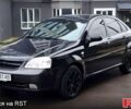 Черный Шевроле Лачетти, объемом двигателя 1.8 л и пробегом 241 тыс. км за 4300 $, фото 1 на Automoto.ua