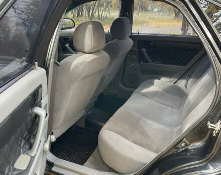 Черный Шевроле Лачетти, объемом двигателя 1.6 л и пробегом 240 тыс. км за 4300 $, фото 5 на Automoto.ua