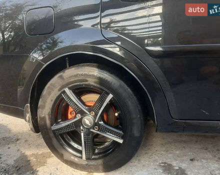 Черный Шевроле Лачетти, объемом двигателя 1.6 л и пробегом 215 тыс. км за 4000 $, фото 4 на Automoto.ua