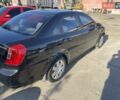 Черный Шевроле Лачетти, объемом двигателя 1.8 л и пробегом 220 тыс. км за 5200 $, фото 1 на Automoto.ua