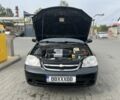 Чорний Шевроле Лачетті, об'ємом двигуна 1.8 л та пробігом 155 тис. км за 5000 $, фото 10 на Automoto.ua