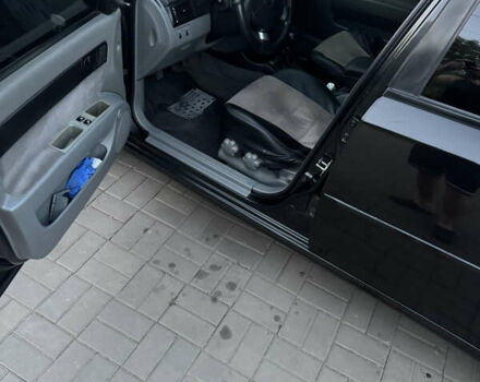 Черный Шевроле Лачетти, объемом двигателя 1.6 л и пробегом 195 тыс. км за 4850 $, фото 5 на Automoto.ua