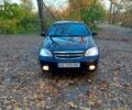 Черный Шевроле Лачетти, объемом двигателя 1.8 л и пробегом 250 тыс. км за 4700 $, фото 1 на Automoto.ua