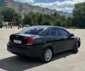 Черный Шевроле Лачетти, объемом двигателя 1.8 л и пробегом 229 тыс. км за 4524 $, фото 1 на Automoto.ua