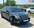 Черный Шевроле Лачетти, объемом двигателя 1.8 л и пробегом 282 тыс. км за 2300 $, фото 1 на Automoto.ua
