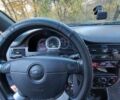 Черный Шевроле Лачетти, объемом двигателя 1.8 л и пробегом 210 тыс. км за 4200 $, фото 24 на Automoto.ua