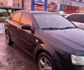 Черный Шевроле Лачетти, объемом двигателя 1.8 л и пробегом 358 тыс. км за 3600 $, фото 1 на Automoto.ua