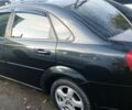 Чорний Шевроле Лачетті, об'ємом двигуна 1.6 л та пробігом 235 тис. км за 3495 $, фото 12 на Automoto.ua