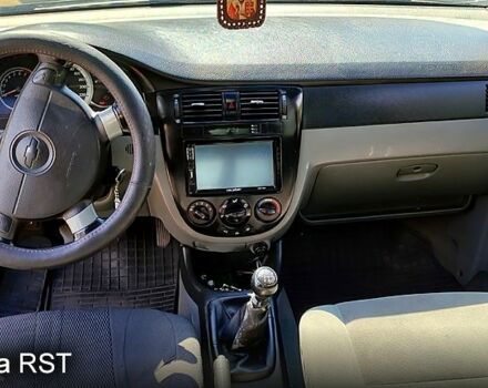 Черный Шевроле Лачетти, объемом двигателя 1.8 л и пробегом 345 тыс. км за 2200 $, фото 3 на Automoto.ua