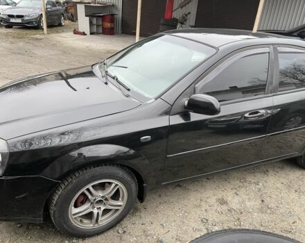 Черный Шевроле Лачетти, объемом двигателя 1.8 л и пробегом 265 тыс. км за 2400 $, фото 1 на Automoto.ua