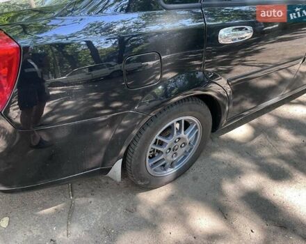 Черный Шевроле Лачетти, объемом двигателя 1.8 л и пробегом 243 тыс. км за 4900 $, фото 2 на Automoto.ua