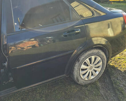 Чорний Шевроле Лачетті, об'ємом двигуна 1.8 л та пробігом 231 тис. км за 4000 $, фото 5 на Automoto.ua