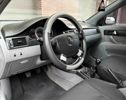 Черный Шевроле Лачетти, объемом двигателя 1.8 л и пробегом 204 тыс. км за 4300 $, фото 12 на Automoto.ua