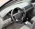 Черный Шевроле Лачетти, объемом двигателя 1.8 л и пробегом 158 тыс. км за 3801 $, фото 6 на Automoto.ua