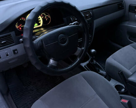 Черный Шевроле Лачетти, объемом двигателя 1.6 л и пробегом 233 тыс. км за 3750 $, фото 14 на Automoto.ua