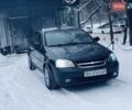 Черный Шевроле Лачетти, объемом двигателя 1.6 л и пробегом 283 тыс. км за 2800 $, фото 1 на Automoto.ua