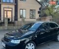 Черный Шевроле Лачетти, объемом двигателя 1.8 л и пробегом 300 тыс. км за 2900 $, фото 1 на Automoto.ua