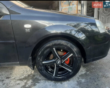 Черный Шевроле Лачетти, объемом двигателя 1.6 л и пробегом 215 тыс. км за 4000 $, фото 3 на Automoto.ua