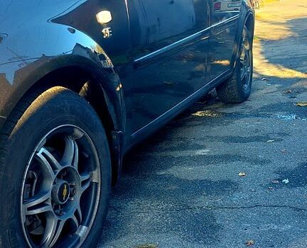 Чорний Шевроле Лачетті, об'ємом двигуна 1.6 л та пробігом 242 тис. км за 4600 $, фото 1 на Automoto.ua