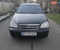 Черный Шевроле Лачетти, объемом двигателя 1.6 л и пробегом 325 тыс. км за 2900 $, фото 1 на Automoto.ua