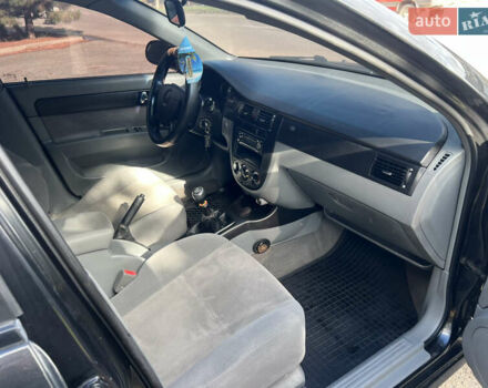 Черный Шевроле Лачетти, объемом двигателя 1.8 л и пробегом 248 тыс. км за 4250 $, фото 21 на Automoto.ua