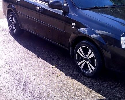 Черный Шевроле Лачетти, объемом двигателя 1.8 л и пробегом 188 тыс. км за 4900 $, фото 5 на Automoto.ua