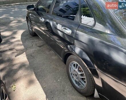 Черный Шевроле Лачетти, объемом двигателя 1.8 л и пробегом 243 тыс. км за 4900 $, фото 5 на Automoto.ua