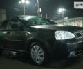 Черный Шевроле Лачетти, объемом двигателя 1.8 л и пробегом 260 тыс. км за 2899 $, фото 1 на Automoto.ua