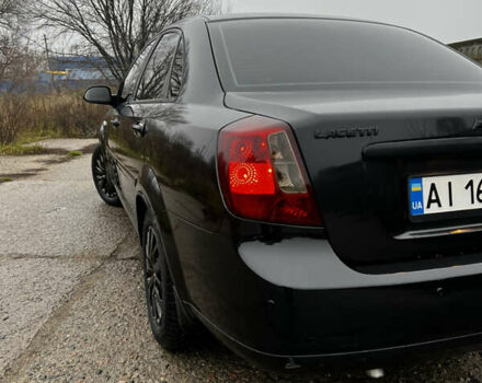 Черный Шевроле Лачетти, объемом двигателя 1.8 л и пробегом 243 тыс. км за 4489 $, фото 5 на Automoto.ua