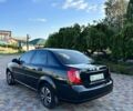 Черный Шевроле Лачетти, объемом двигателя 1.8 л и пробегом 320 тыс. км за 3850 $, фото 1 на Automoto.ua