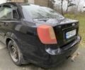 Черный Шевроле Лачетти, объемом двигателя 1.6 л и пробегом 264 тыс. км за 1999 $, фото 11 на Automoto.ua