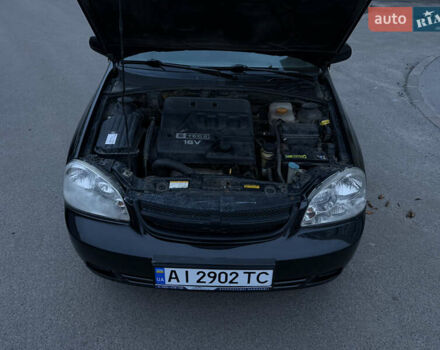 Черный Шевроле Лачетти, объемом двигателя 1.6 л и пробегом 233 тыс. км за 3750 $, фото 12 на Automoto.ua