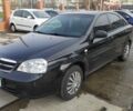 Черный Шевроле Лачетти, объемом двигателя 1.6 л и пробегом 288 тыс. км за 5899 $, фото 1 на Automoto.ua