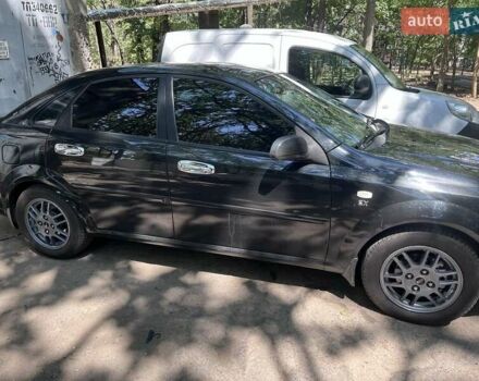 Черный Шевроле Лачетти, объемом двигателя 1.8 л и пробегом 243 тыс. км за 4900 $, фото 4 на Automoto.ua