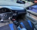 Черный Шевроле Лачетти, объемом двигателя 1.6 л и пробегом 220 тыс. км за 2350 $, фото 5 на Automoto.ua