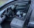 Черный Шевроле Лачетти, объемом двигателя 1.8 л и пробегом 205 тыс. км за 2250 $, фото 1 на Automoto.ua