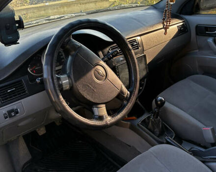 Чорний Шевроле Лачетті, об'ємом двигуна 1.8 л та пробігом 231 тис. км за 4000 $, фото 7 на Automoto.ua