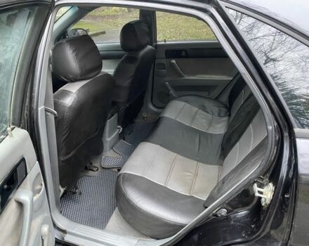 Черный Шевроле Лачетти, объемом двигателя 1.6 л и пробегом 264 тыс. км за 1999 $, фото 3 на Automoto.ua