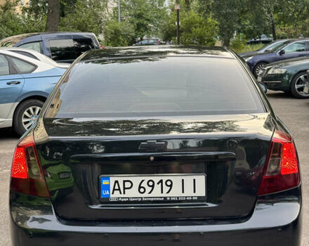 Черный Шевроле Лачетти, объемом двигателя 1.6 л и пробегом 252 тыс. км за 5700 $, фото 1 на Automoto.ua