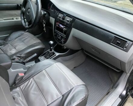 Черный Шевроле Лачетти, объемом двигателя 1.6 л и пробегом 264 тыс. км за 1999 $, фото 4 на Automoto.ua